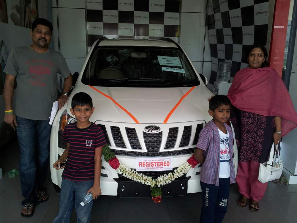 Girish and family with their new SUV
