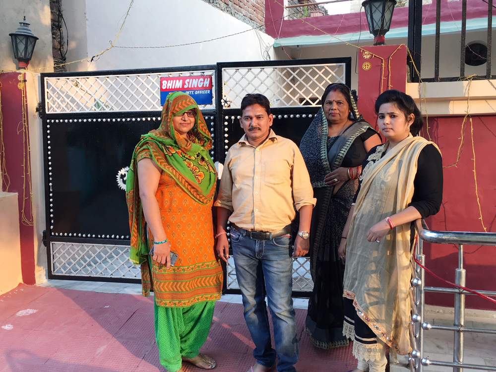 Internet saathi Deepa Rajput (left) with her husband and student Babita Singh (far right) in Dehtora village