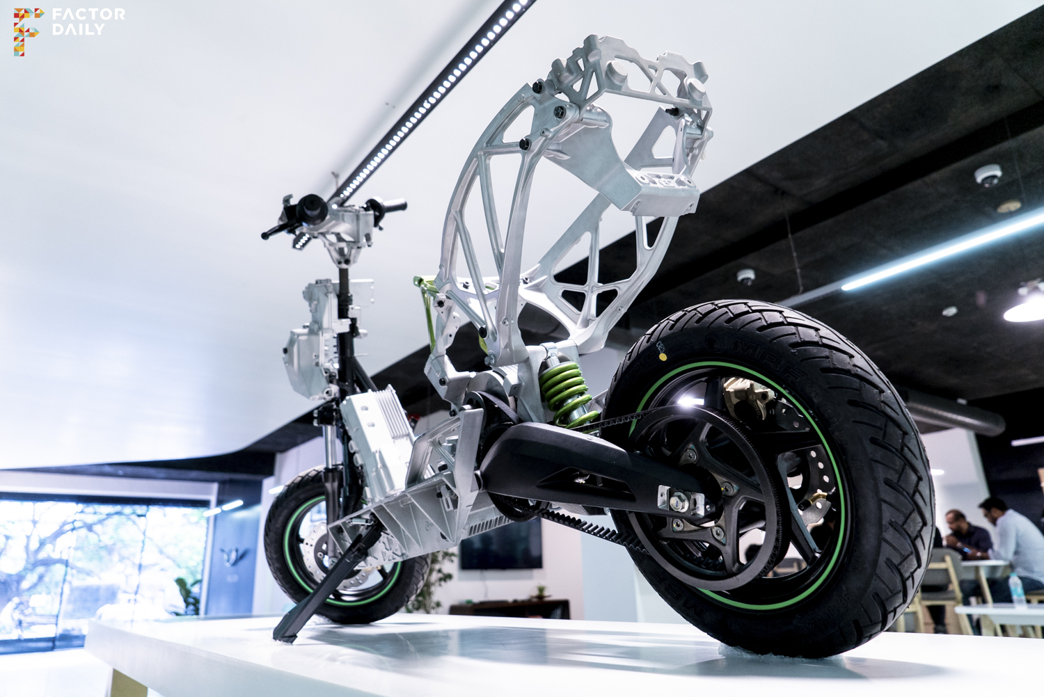 The electric scooter's exposed frame displayed at the Ather's experience center in Indiranagar