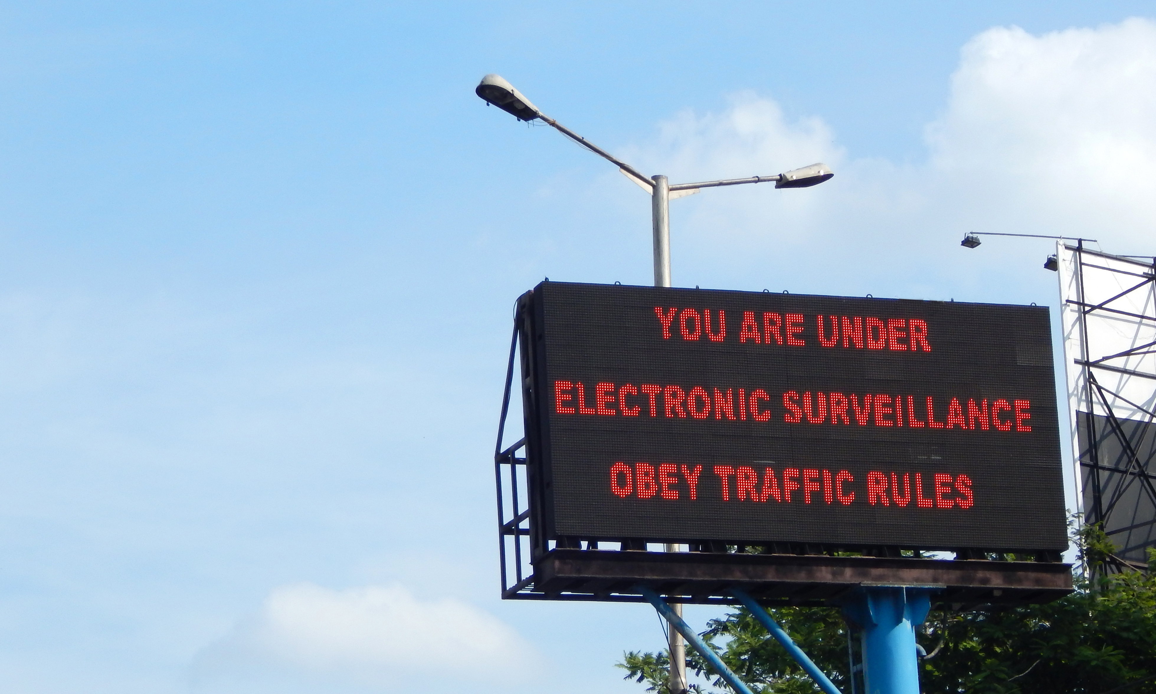 An LED display in Hyderabad warning vehicles of ongoing surveillance on the roads