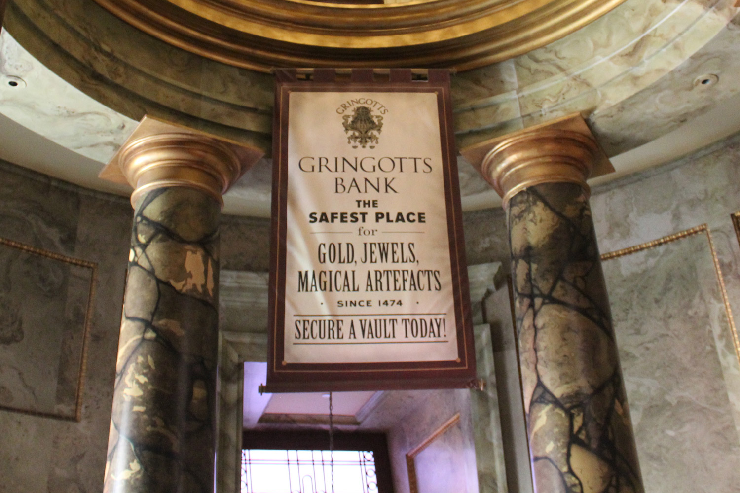 A plaque at the entrance of Harry Potter's Gringotts Wizarding Bank at Universal Studios Florida